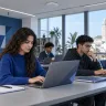 ALLSAFE SOLUTIONS team meeting around a laptop