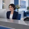 ALLSAFE SOLUTIONS team meeting around a laptop